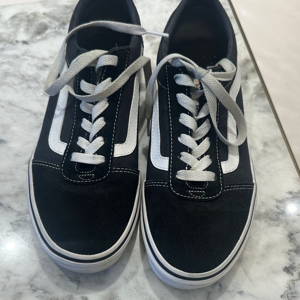 Women’s Black and White Vans Sneakers
